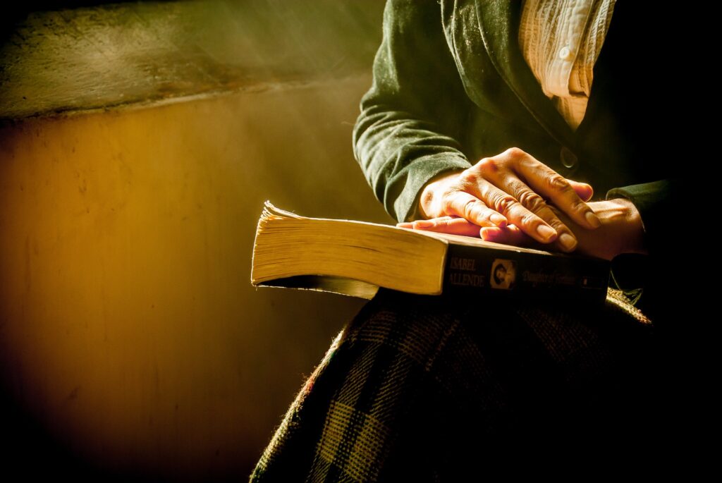 Woman Holding a Bible