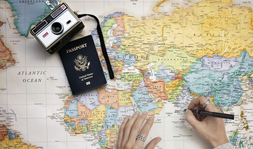Passport and world map