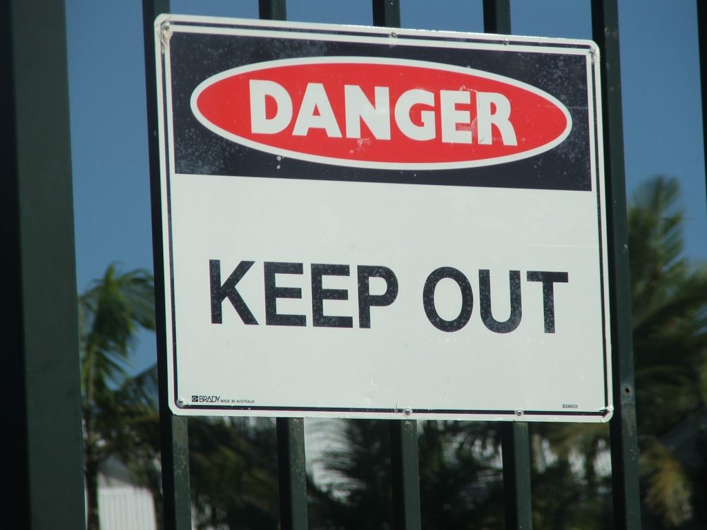 A sign announcing danger