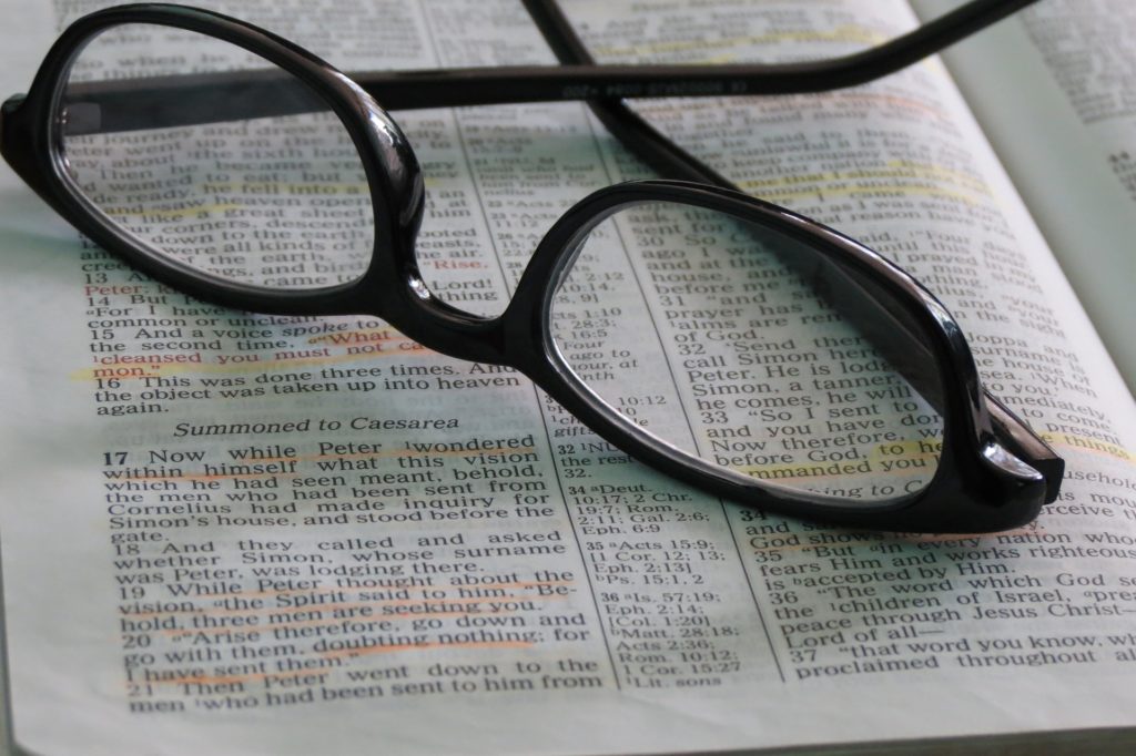 Eyeglasses on a Bible