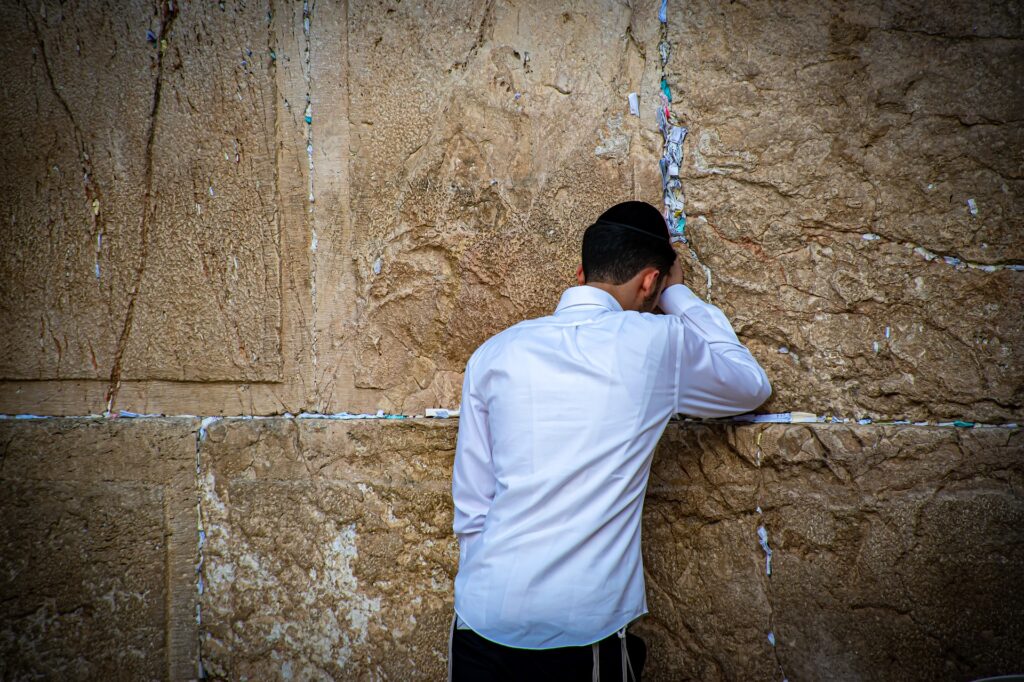 Man praying at the Western Wall