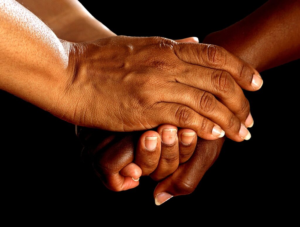 Hands together representing help